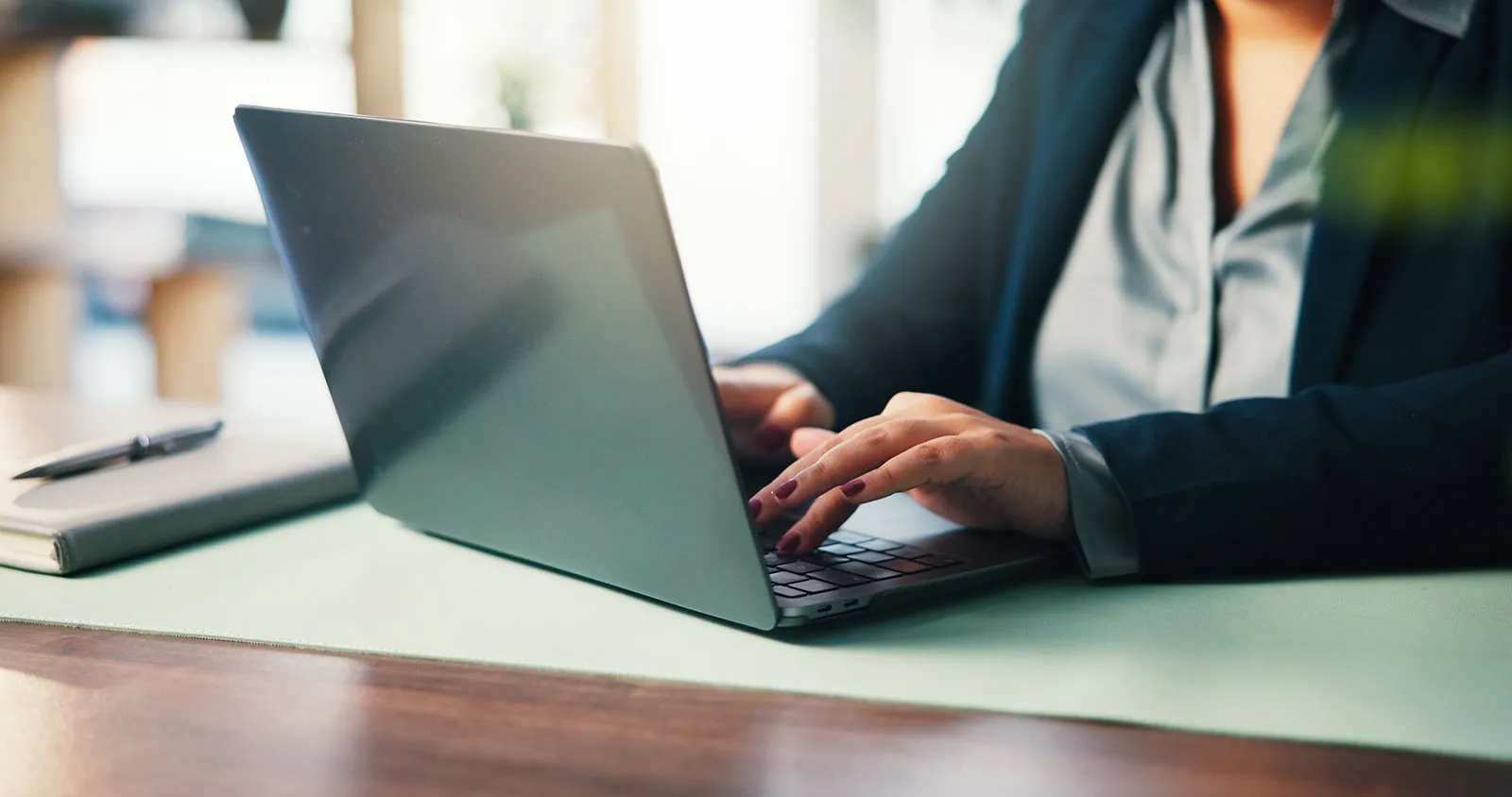 a person working at a laptop